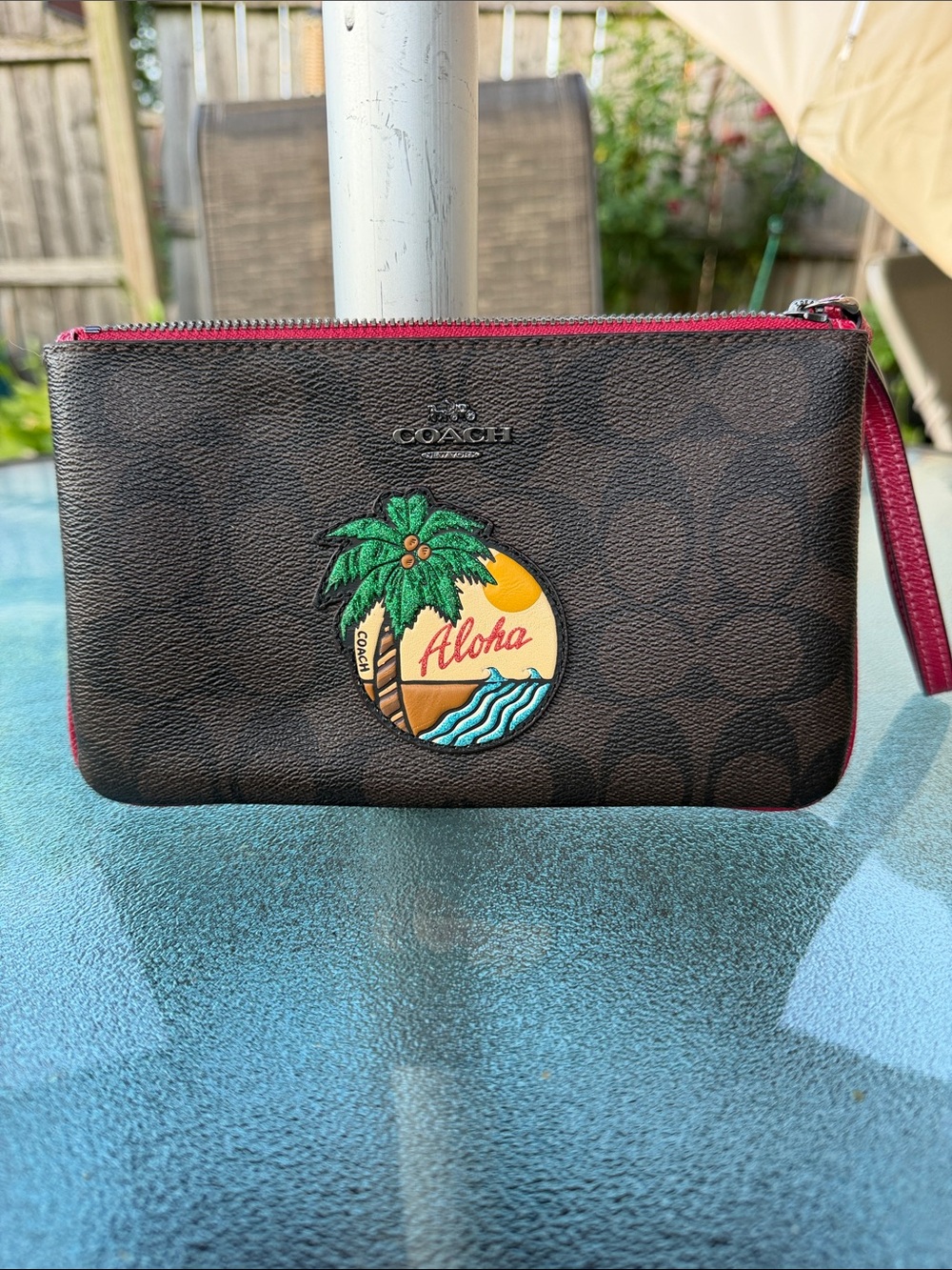 Coach Brown Signature Wristlet with Aloha Patch and Pink Trim